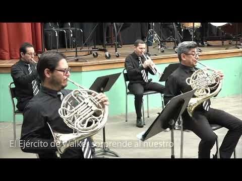 Fantasie über die Schlachten von Santa Rosa und Rivas (zwischen 1855 und 1865) des in Bilbao geborenen Pantaleón de Zamacois y Urrutia. Aufgeführt von der Heredia Concert Band (Costa Rica). Mit der Bassdrum werden die Kanonenschüsse des Krieges und mit der Kleinen Trommel die Artillerie der Soldaten nachgeahmt.