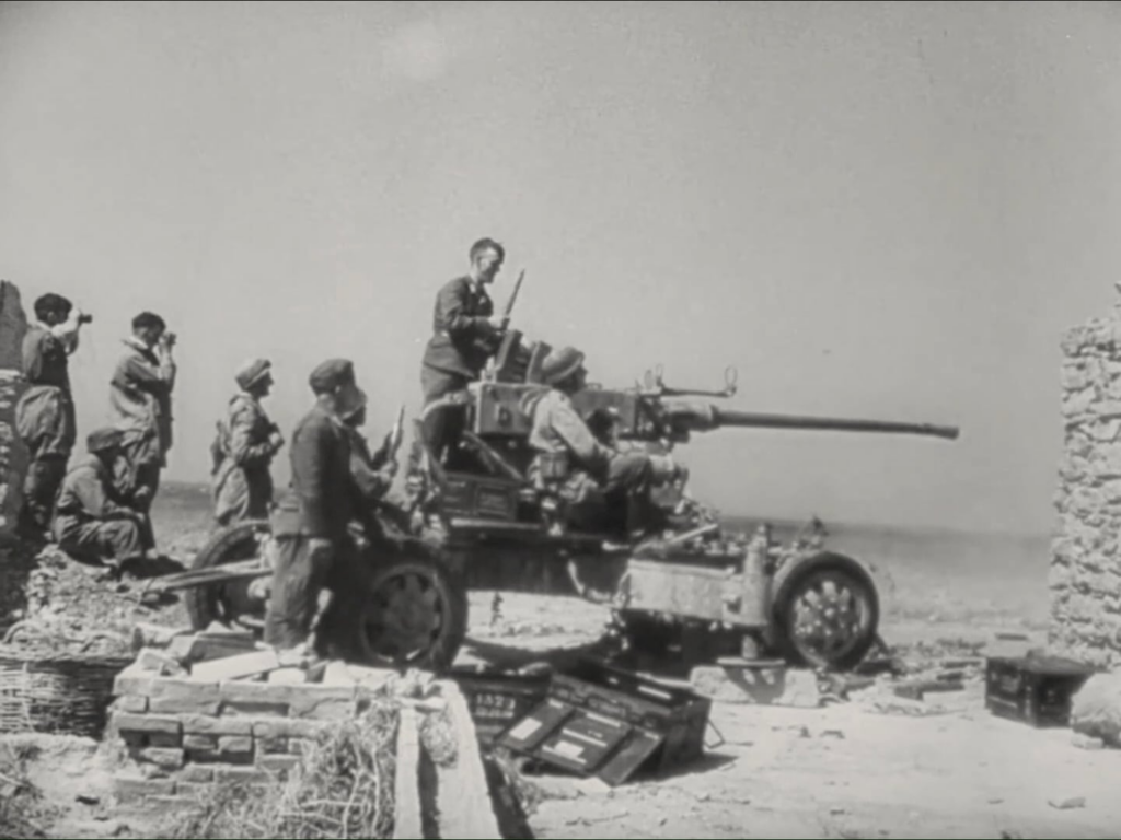Deutsche Fallschirmjäger drehen eine gefangene Bofors 40 -mm -Waffe gegen seine ehemaligen Benutzer auf Kreta im Mai 1941