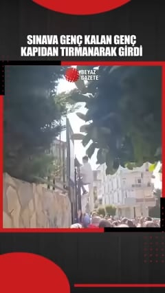 Ein junger Mensch, der zu spät für YKS war, versuchte, die Prüfung zu machen, indem er durch die Tür der Schule kletterte.