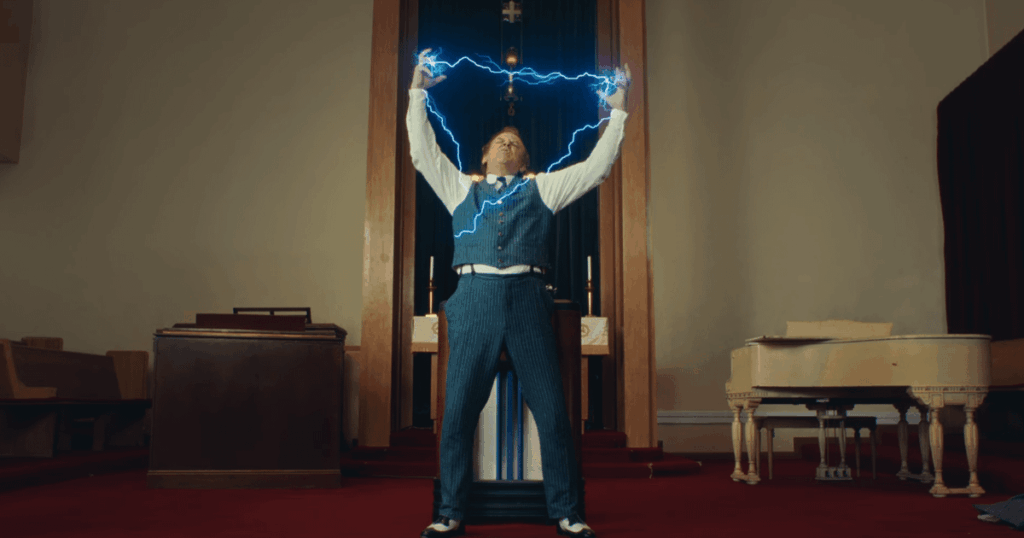 John C. Reilly spielt in Jack Whites Musikvideo für "Erzbischof Harold Holmes": "Es ist fast wie eine perfekte Fan -Fantasie".