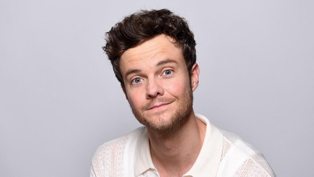 Jack Quaid sagte, er habe Tom Holland auf einer Party getroffen und erfuhr, dass er ein Fan von "The Boys" ist. Ich sagte: 'Es gibt keine Möglichkeit, dass Spider-Man weiß, wer ich bin. Das ist verrückt. '