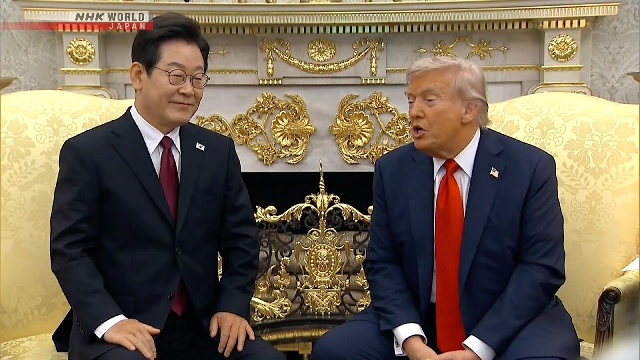 Trump trifft den Leiter von S. korean, wirkt mit N. Koreas Kim zusammen